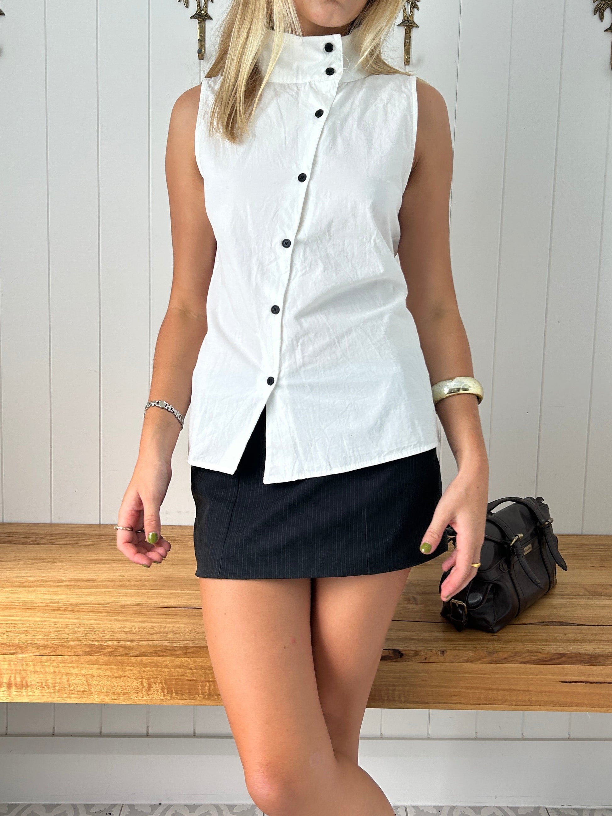Asymmetrical button top